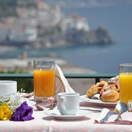 Couette-café Maria Luigia 2*